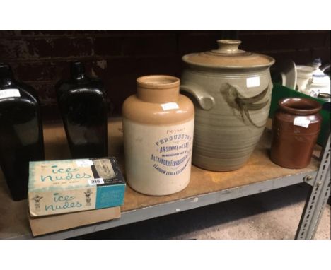 SHELF WITH 2 GLASS OLIVE OIL CONTAINERS, STONEWARE PICKLING JAR, JAR CRACKED &amp; 1 OTHER &amp; A STONEWARE POISON JAR BY FE