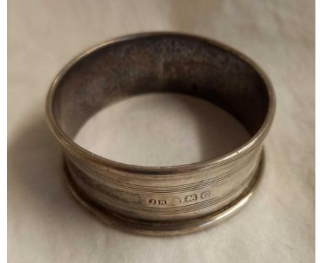 A SILVER NAPKIN RING, B'HAM 1927