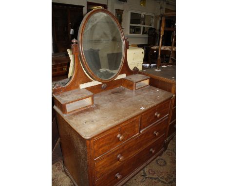 A Victorian mahogany dressing chest with central mirror. 105cm wide. and A Victorian brass fender 158cm length -2 Best Bid