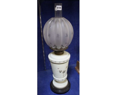 A pale green opaline glass and brass oil lamp with gourd shaped shade, 58cm high 