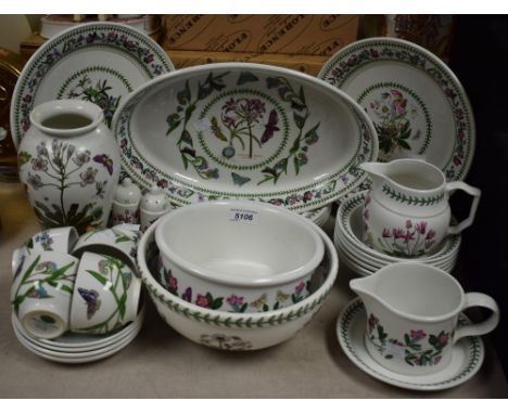 A Portmeirion Botanic Gardens pattern table service including dinner plates, bowls, cups, saucers, fruit bowl, vase; etc 