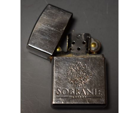 A Sobranie flip top Zippo style petrol pocket lighter