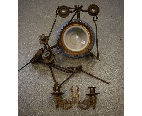 A hanging pottery/brass lamp