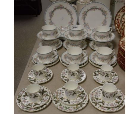 A Wedgwood Strawberry Hill coffee set for six comprising side plates, coffee cans and saucers; another, Coalport April part t