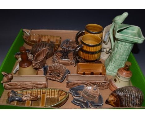 A Wade novelty rowing boat and fisherman; another with a seagull, a Wade eagle bottle pourer, cat and dog pin dishes, a crab 