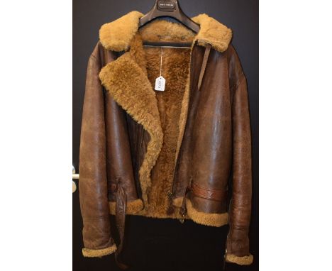 A brown leather sheepskin lined flight jacket, US Army style
