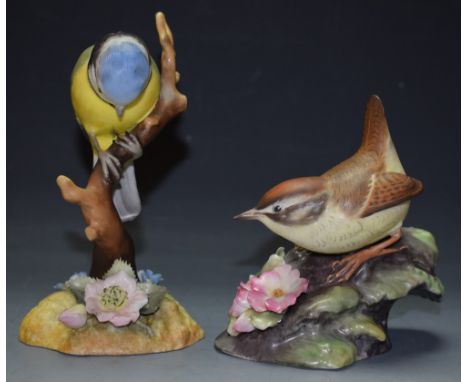 A Royal Crown Derby ceramic model of a blue tit, signed J Griffiths, boxed; another, Wren, signed C Windridge, boxed (2)