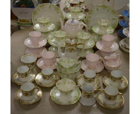 A Heathcote Georgian pattern twelve setting tea set, green printed marks; a Noritake six setting coffee service; a Tuscan chi