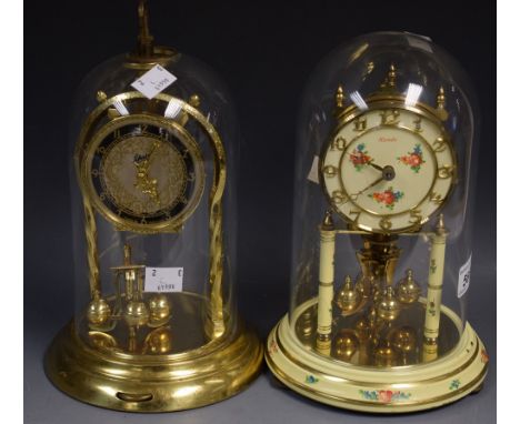 Two anniversary clocks, one with floral enamel decoration