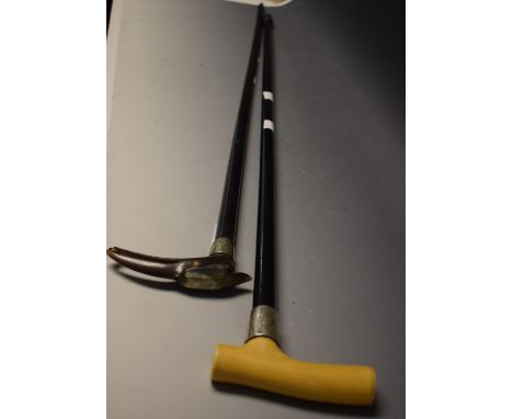 A carved stained horn and silver mounted walking stick, birds head handle, Chester 1894;  another 1896 (2)