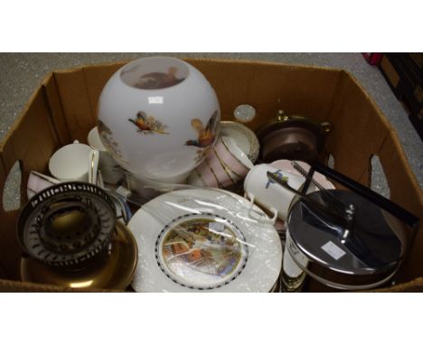 An oil lamp; a chrome ice bucket and cover with tongs; a set of twelve Christmas plates; a brass mounted petit-point clock; o