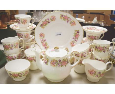 A Colclough Wayside pattern tea set comprising six cups, saucers and tea plates, bread and butter plate, teapot, milk and sug