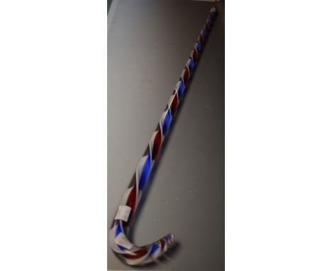 A hand made glass frigger walking stick,  union jack spiraled three colour red white and blue haft, tapering crook handle, Ch