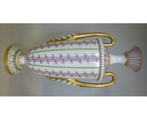 A Royal Worcester china shouldered, pedestal vase having opposing, high loop handles, a narrow neck and a flared cup rim, dec
