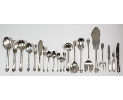 A George V silver table service with moulded handles and leaf pattern terminals (for twelve place settings), by A.E.Poston & 