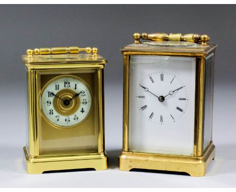 Two late 19th/early 20th Century French carriage timepieces, the miniature style version with 1.875ins diameter cream enamel 