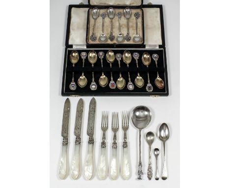 A set of six Victorian silver fruit knives and six fruit forks with engraved blades and carved mother-of-pearl handles, by Wa