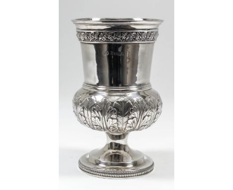 A George IV silver urn pattern goblet of large proportions, the body with moulded rim above cast band of fruiting vines, the 