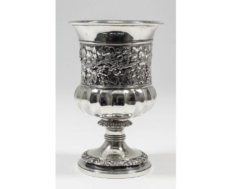 A George IV silver urn-pattern wine goblet with moulded rim and partly fluted lower body, the centre band embossed with a wid
