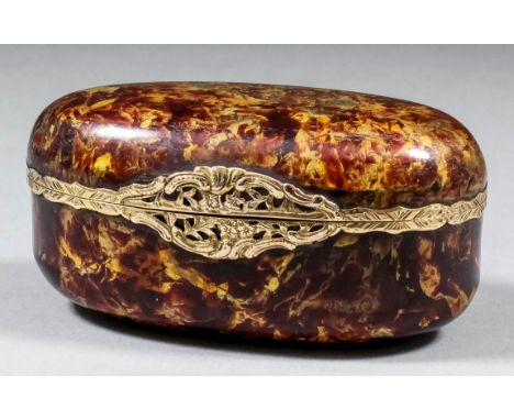 A late 18th Century French Vernis Martin and gold coloured metal mounted oval snuff box, the Vernis Martin mottled body with 