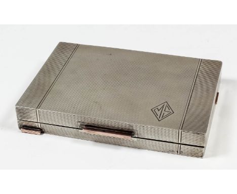 A George VI silver rectangular cigarette case/compact with engine turned ornament, the lid engraved with initials "M.S", 4.87