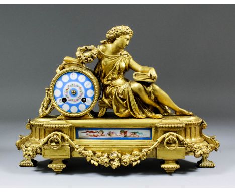 A late 19th Century French gilt metal and porcelain mounted mantel clock by Japy Freres, No. 0354, the 3ins diameter porcelai