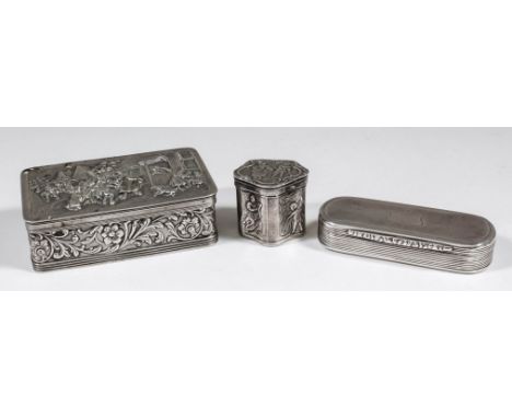 An early 20th Century Dutch silvery metal rectangular trinket box, the lid embossed with figures outside buildings, the sides