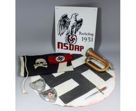 A German aluminum sign painted in black and red with an eagle over swastika over "NSDAP" (National Socialist German Workers P