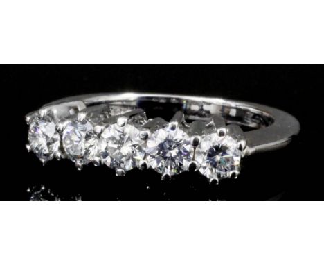 A modern 18ct white gold five stone diamond ring, the brilliant cut stones each approximately .20ct (gross weight 4.9 grammes