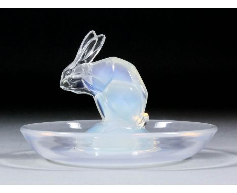 An early 20th Century Lalique opalescent glass "Lapin" ring stand (model No.285) 4ins diameter x 2.5ins high (circa 1925 - en