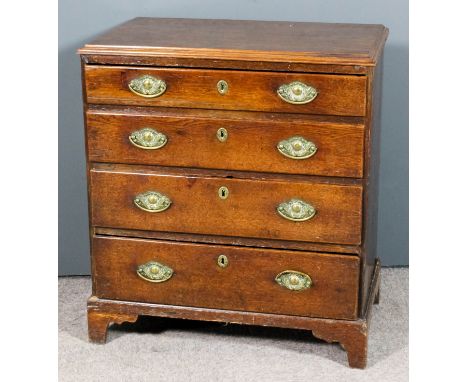 A late Georgian oak and pine sided chest with moulded edge to top, fitted four long graduated drawers now with baize lined cu