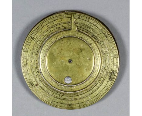 An unusual 18th Century brass and bone circular double sided pocket calendar, one side showing months, signs of the Zodiac an