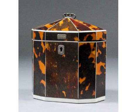 A George III small ten sided tortoiseshell single tea caddy inlaid, the angled top with silvery metal folding handle to, escu