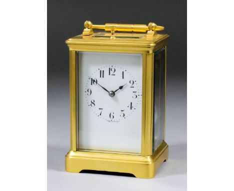 A late 19th/early 20th Century French carriage clock, the white enamel dial with Arabic numerals, to the eight day two train 