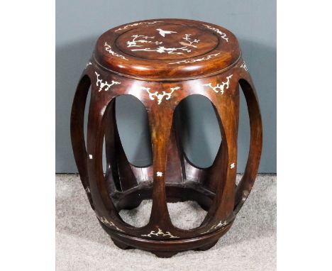 A Chinese hardwood and mother-of-pearl inlaid barrel-shaped stool, the top inlaid with birds and flowering branches (one inla