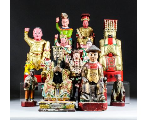 A Chinese carved polychrome and giltwood seated figure of Yu Huang Shangdi - Jade Emperor, The Lord on High, The Great Empero