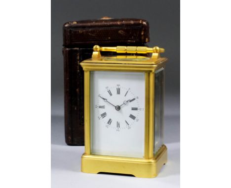 A late 19th Century French carriage clock, No.2394, the white enamel dial with Roman and Arabic numerals, to the eight day tw