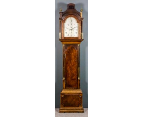 An oak and walnut longcase clock containing late 18th Century movement by Hayler of Chatham, the 12ins arched silvered dial w