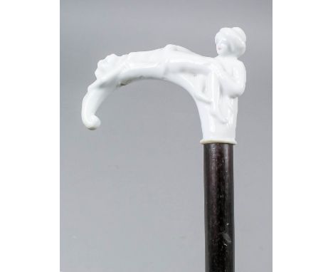 A Private Collection of Walking Sticks and Canes A late 19th/early 20th Century white glazed porcelain mounted walking stick,