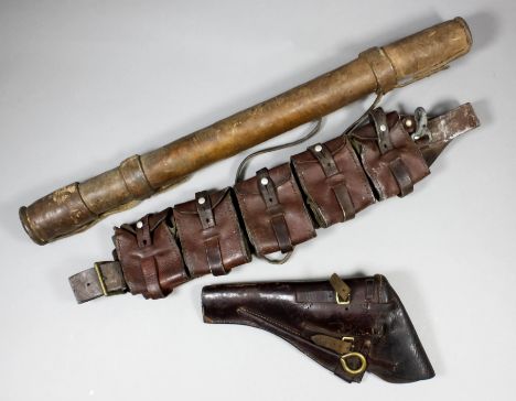 A good Webley .55 brown leather holster with brass cleaning rod, a brown leather bandolier with five pouches, and a leather m