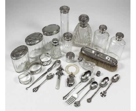 A late Victorian silver topped and cut glass scent bottle of square tapered form with slice cuttings, the silver top embossed