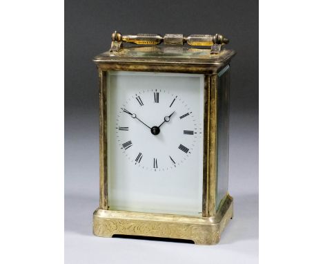 A late 19th Century French carriage clock, the white enamel dial with Roman numerals, to the eight day two train movement str