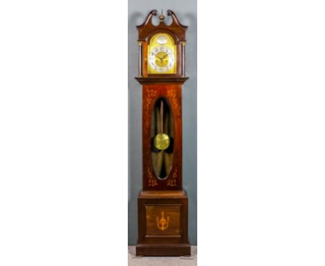 An early 20th Century dark stained mahogany longcase clock, the 10ins arched brass dial with silvered chapter ring with Arabi