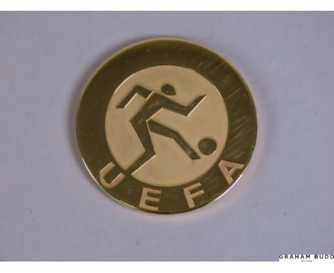Mal Donaghy's yellow-metal 1991 European Super Cup winner's medal the obverse inscribed UEFA, the reverse inscribed SUPER COM