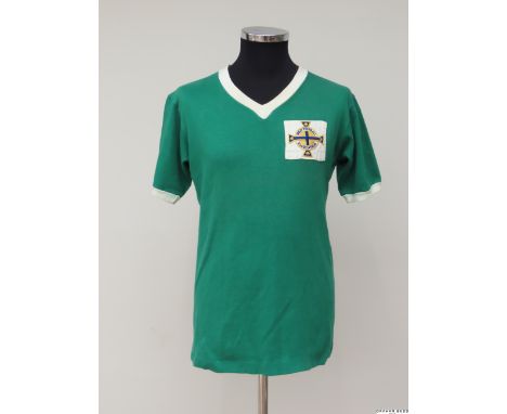 George Best green and white No.7 Northern Ireland International reputed match worn short-sleeved shirt, 1964, Bukta, 38 with 