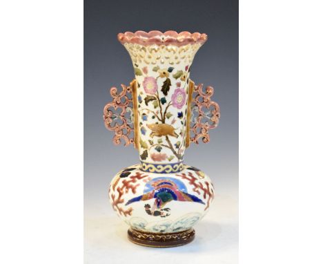 Jos. Steidl Austrian pottery vase having hand painted enamel decoration of an arrow struck flying pig and an exotic bird carr