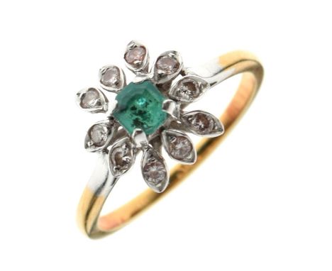 Unmarked yellow metal, emerald and diamond cluster ring of flowerhead design, size S½, 4.2g gross approx  