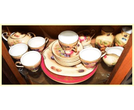 Aynsley fruit-printed six setting tea service comprising: cups, saucers, milk jug, oval two-handled sucriere and cake plate, 