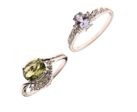 18ct white gold dress ring set large pale green stone, size N, together with a 9ct white gold dress ring set Tanzanite-colour