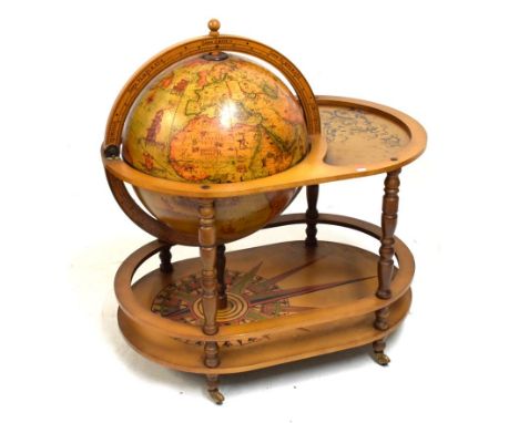 Late 20th Century stained beech and walnut finish globe design cocktail trolley having hinged Northern hemisphere, 88cm long 